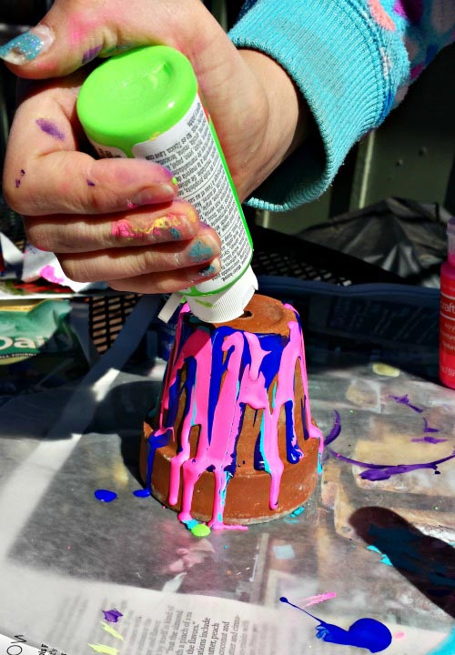 Easy Mothers Day craft and gift idea - rainbow painted pots with flowers!