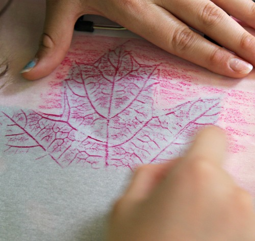 Leaf rubbings with crayons on parchment paper - easy Fall craft for kids!